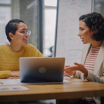 Colleagues discussing a project